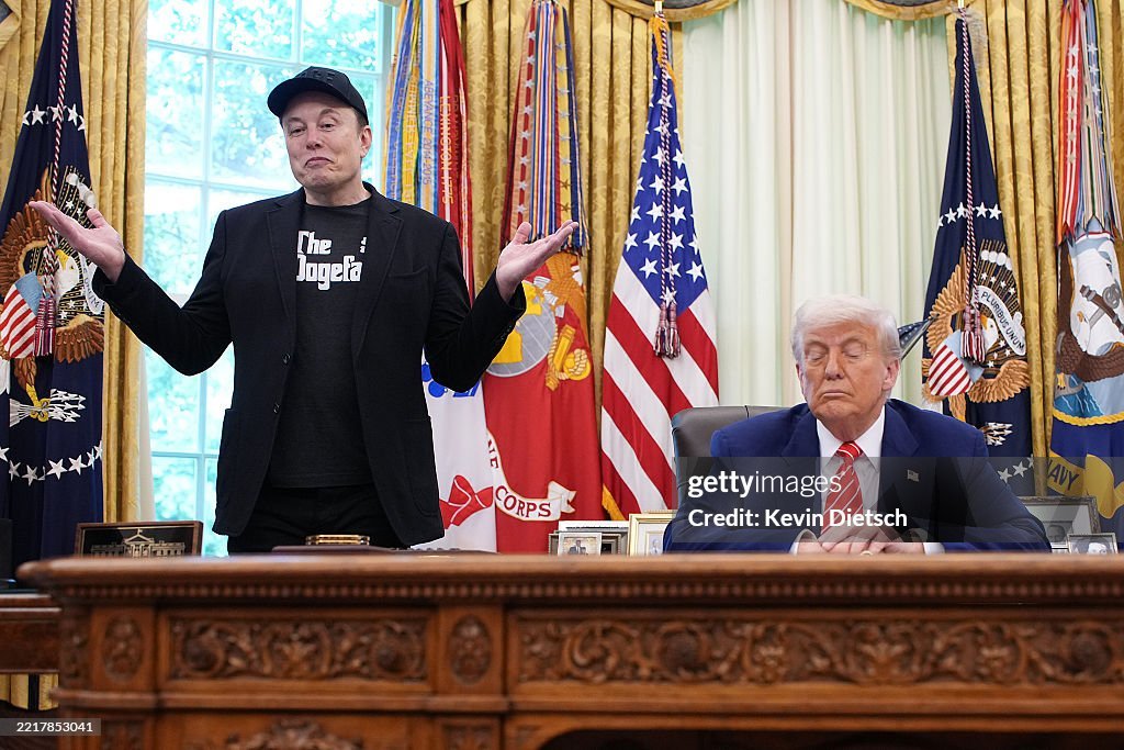 Two Men In An Office Setting.