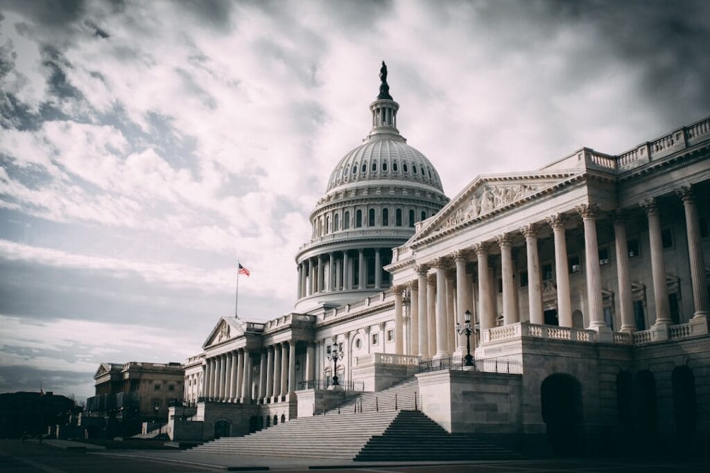 US Capitol building under dramatic sky representing federal regulatory action on mortgage trigger leads through the Homebuyers Privacy Protection Act